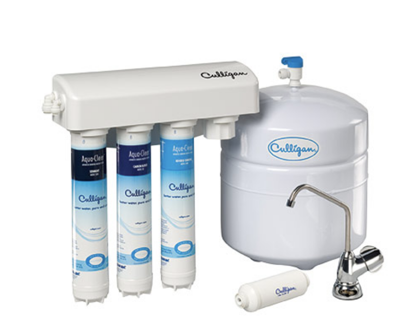 Image of a reverse osmosis drinking system complete with storage tanks and filtration tubes.
