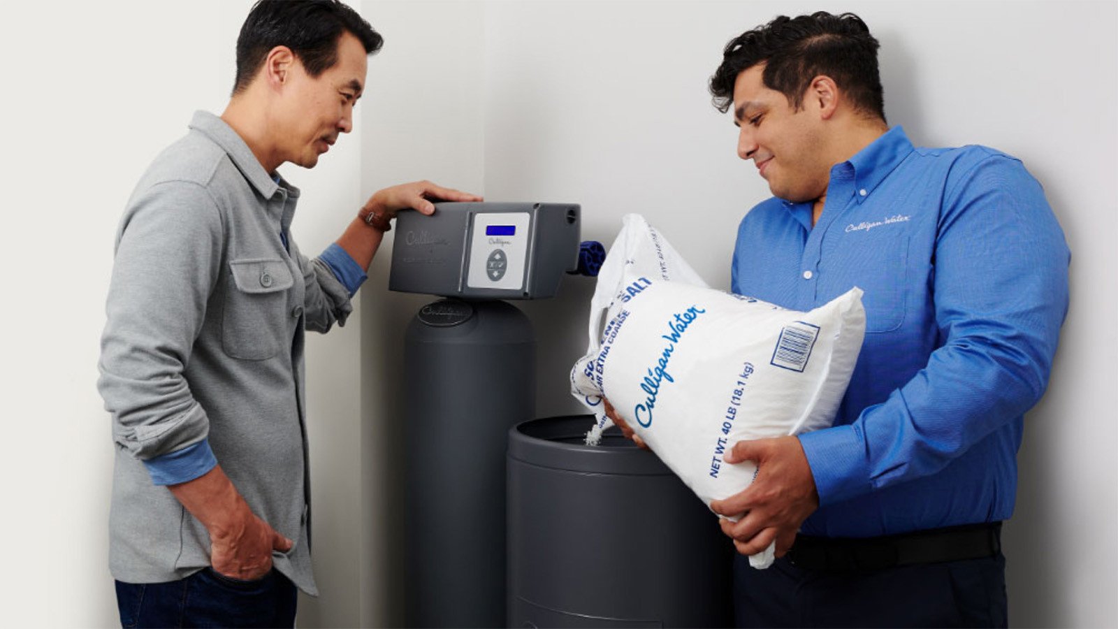 Culligan Man filling a water softener with salt